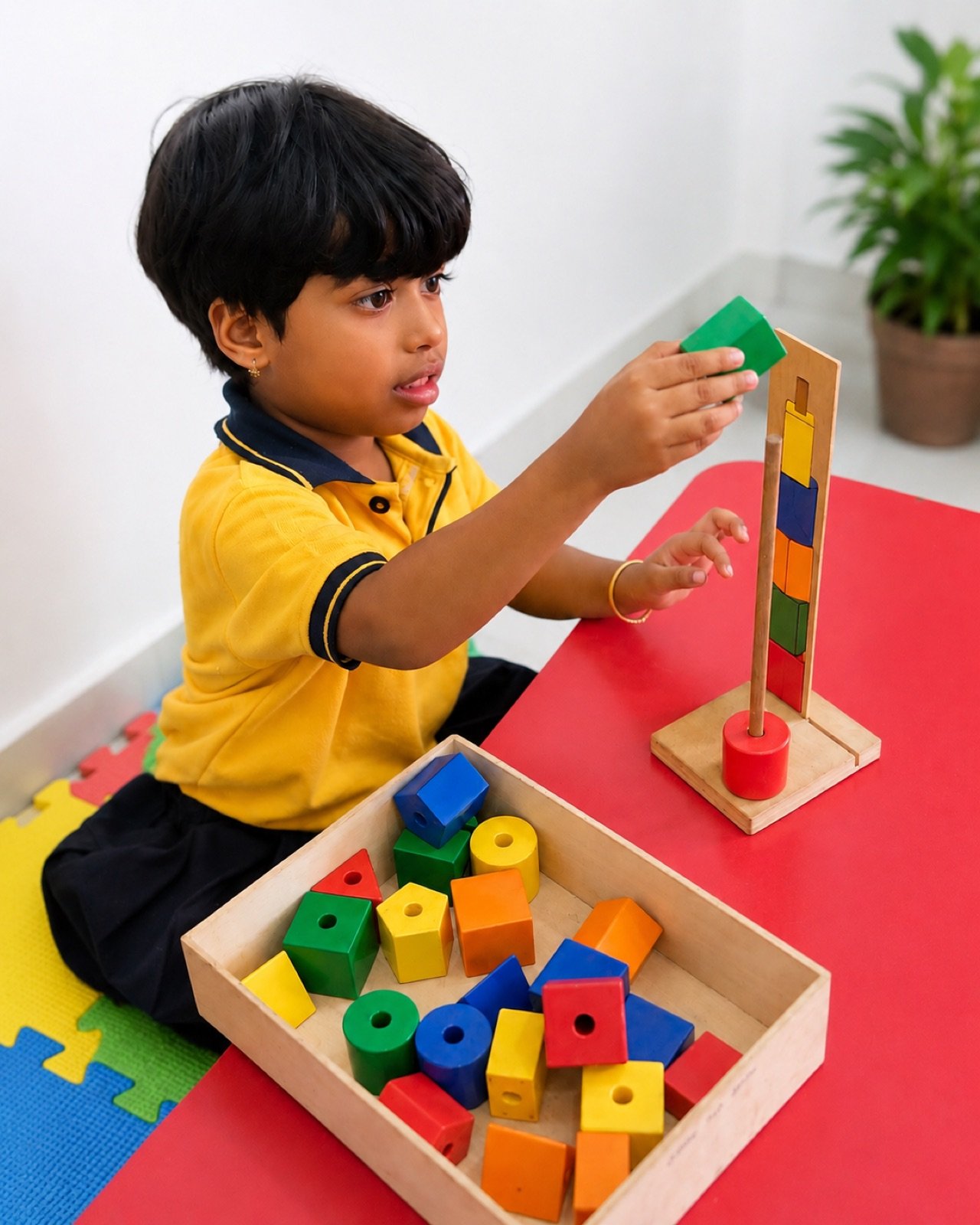 A KIDZEE @ Kirathoor student engaged in play-based learning